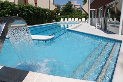 Seasonal outdoor pool, pool umbrellas, sun loungers