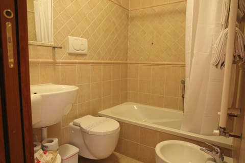 Standard Double or Twin Room | Bathroom | Free toiletries, hair dryer, towels