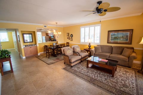 Deluxe Condo, Bay View | Living area | 32-inch flat-screen TV with cable channels, TV