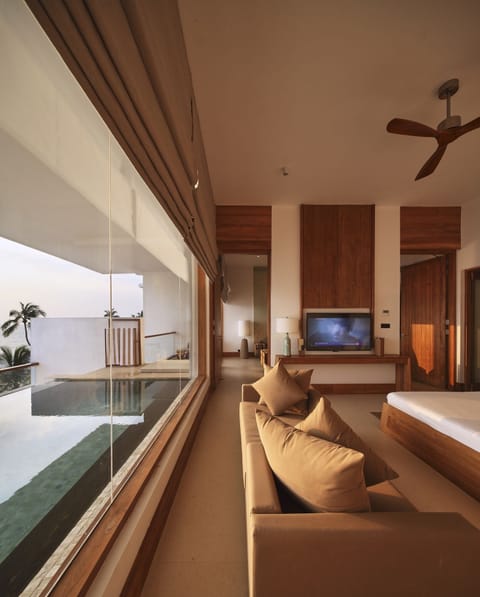 Presidential Suite, 1 King Bed, Ocean View | Living area | Flat-screen TV, iPod dock