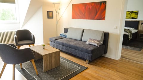 Ferienwohnung Witwe & Bolte | Living room | Flat-screen TV