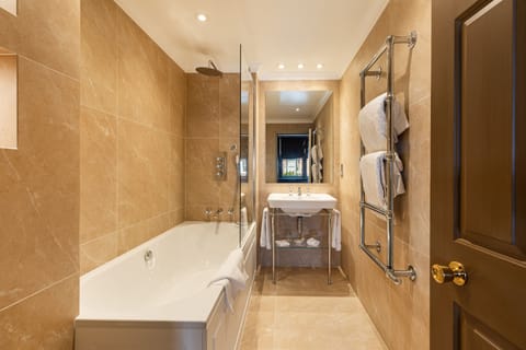 Deluxe Double Room | Bathroom | Designer toiletries, hair dryer, bathrobes, slippers