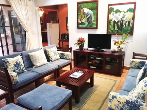 Deluxe House, Multiple Beds, Non Smoking | Living area | Flat-screen TV