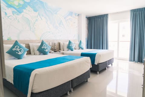 Junior Suite, 2 Queen Beds, Partial Ocean View | Premium bedding, free minibar items, in-room safe, soundproofing