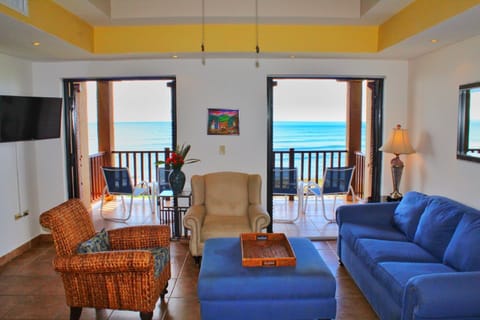 Premium Suite, Multiple Bedrooms, Non Smoking, Ocean View | Living area | Flat-screen TV