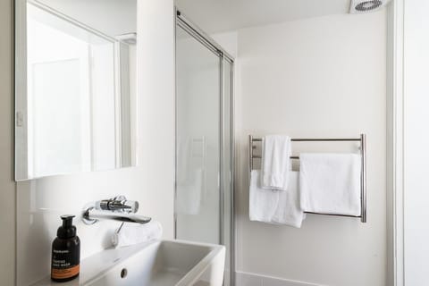 Twin King Single | Bathroom | Shower, rainfall showerhead, designer toiletries, hair dryer