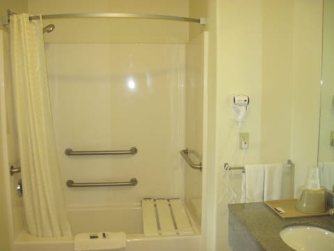 Deluxe Room, 1 King Bed, Smoking | Bathroom | Combined shower/tub, free toiletries, hair dryer, towels