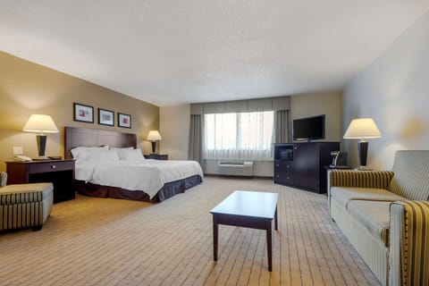 Suite, 1 King Bed, Accessible, Non Smoking | Desk, laptop workspace, blackout drapes, iron/ironing board