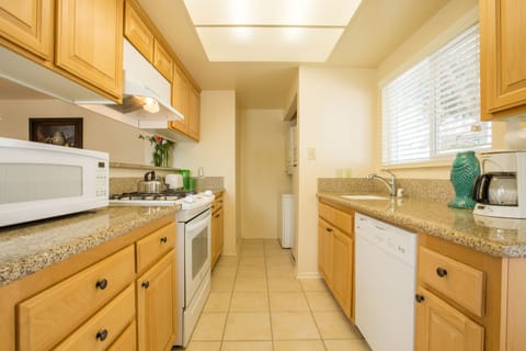 Suite, 2 Bedrooms, Non Smoking | Private kitchen | Full-size fridge, microwave, oven, stovetop