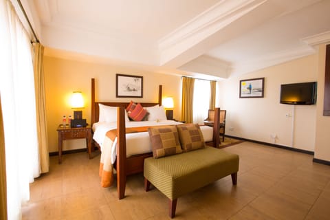 Executive Room | Memory foam beds, minibar, in-room safe, individually decorated