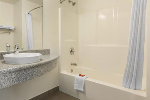 Standard Room, 1 Queen Bed, Non Smoking, Refrigerator & Microwave | Bathroom | Combined shower/tub, hair dryer, towels, soap