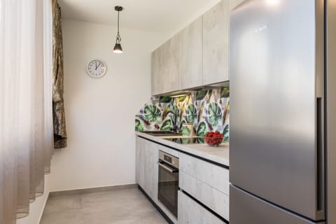 Apartment | Private kitchen | Fridge, electric kettle, cookware/dishes/utensils