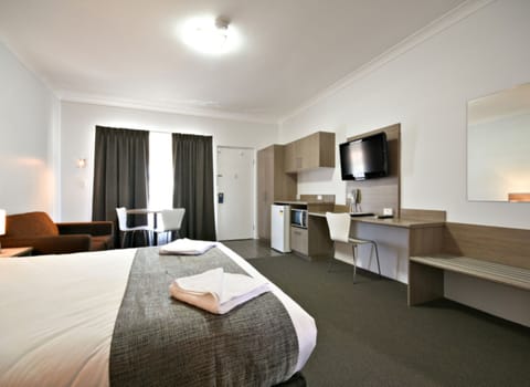 Executive Room  | Premium bedding, desk, blackout drapes, iron/ironing board