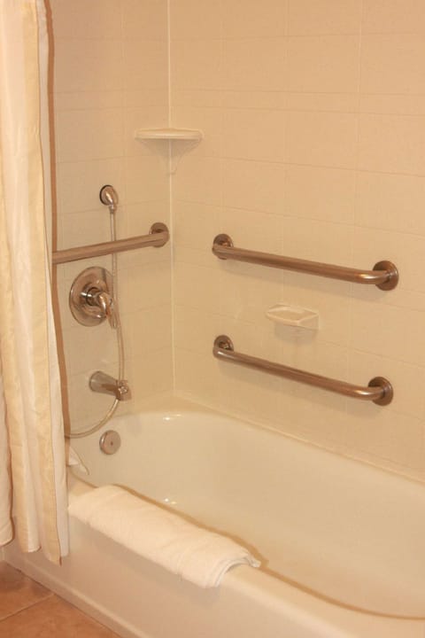 Combined shower/tub, deep soaking tub, free toiletries, hair dryer