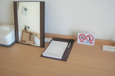 Desk, laptop workspace, blackout drapes, iron/ironing board
