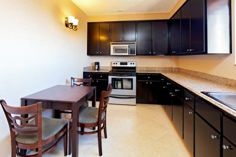 Suite, 1 Bedroom | Private kitchen | Fridge, microwave, coffee/tea maker