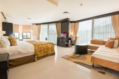 Junior Suite Volcano View | Minibar, individually decorated, individually furnished, desk