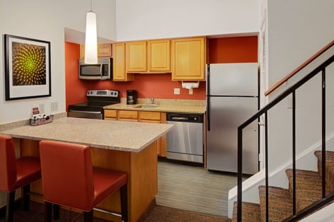 Suite, 2 Bedrooms | Private kitchen | Fridge, microwave, stovetop, dishwasher