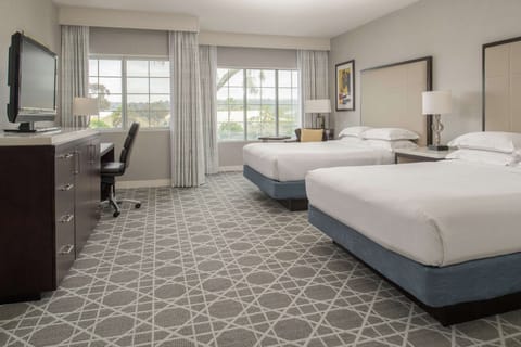Deluxe Room, 2 Queen Beds | Hypo-allergenic bedding, down comforters, in-room safe, desk