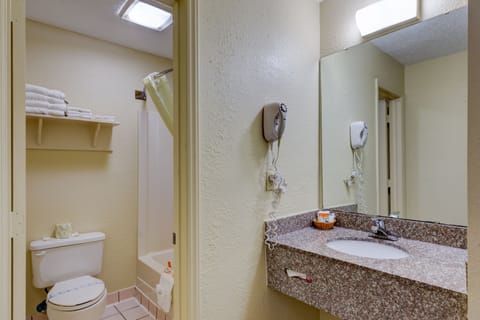 Room, 2 Double Beds | Bathroom | Rainfall showerhead, hair dryer, toilet paper