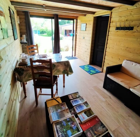 Suite, Garden View (Cottage) | Living area | Flat-screen TV, offices