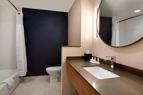 Room, 2 Queen Beds | Bathroom | Combined shower/tub, free toiletries, hair dryer, towels