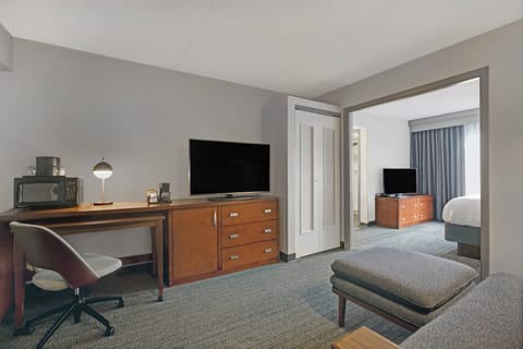 Suite, 1 Bedroom | Desk, laptop workspace, blackout drapes, iron/ironing board