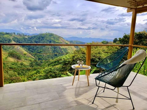 Bungalow, Garden View | Desk, bed sheets