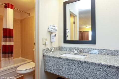 Superior Room, 1 King Bed, Non Smoking | Bathroom | Combined shower/tub, free toiletries, towels, soap