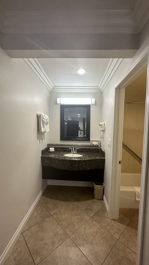 Deluxe Room, 2 Queen Beds | Bathroom sink