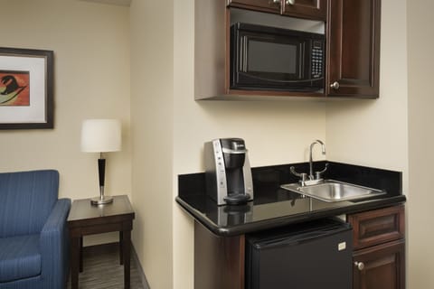 Desk, blackout drapes, iron/ironing board, rollaway beds