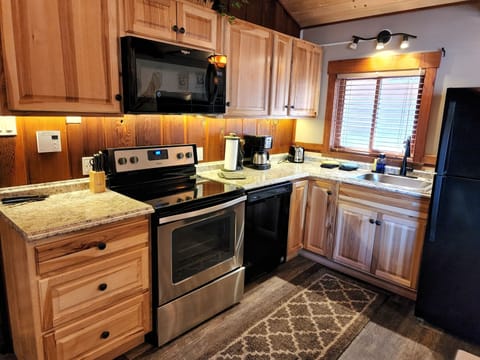 Luxury Cabin, 3 Bedrooms, Hot Tub, River View | Private kitchen | Microwave, coffee/tea maker, toaster, highchair