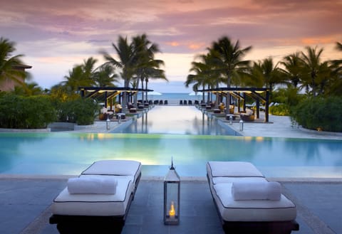 12 outdoor pools, cabanas (surcharge), pool umbrellas