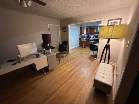 Elite Studio Suite, 1 King Bed | Living area | TV, fireplace