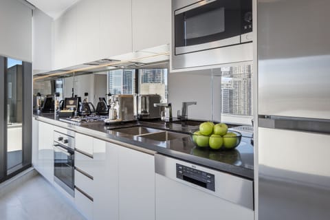 3 Bedroom Darling Penthouse | Private kitchen | Full-size fridge, microwave, stovetop, dishwasher