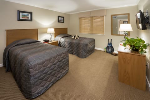 Signature Suite, 2 Bedrooms | 2 bedrooms, desk, iron/ironing board, free cribs/infant beds