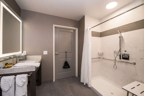Suite, 1 King Bed, Accessible, Non Smoking (Walk-in Shower;with Sofabed) | Bathroom | Deep soaking tub, free toiletries, hair dryer, towels