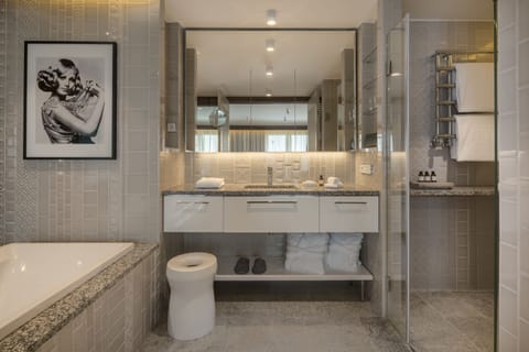 Suite - SPA access | Bathroom | Designer toiletries, hair dryer, bathrobes, slippers