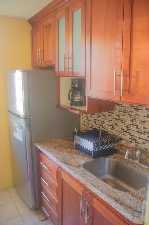 Family Apartment, 2 Queen Beds, Ocean View, Beachfront | Private kitchen | Full-size fridge, microwave, oven, stovetop