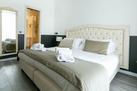 Premium bedding, down comforters, memory foam beds, in-room safe