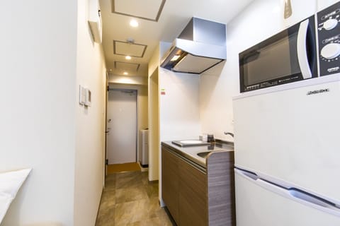 Double Room, ANNEX Nica's Makishi station 2 | Private kitchen | Fridge, microwave