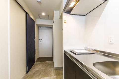 Twin Room, ANNEX Nica's Makishi station 1 | Private kitchen | Fridge, microwave