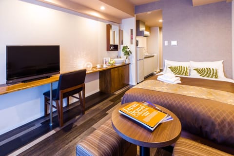 Double Room | Living area | Flat-screen TV