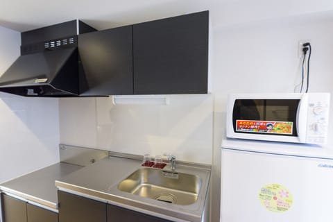 Standard Double Room | Private kitchenette | Fridge, microwave