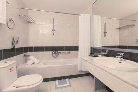 Combined shower/tub, hair dryer, bathrobes, slippers