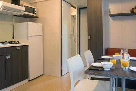 Basic Mobile Home, 2 Bedrooms | Private kitchenette | Full-size fridge, microwave, stovetop, cookware/dishes/utensils