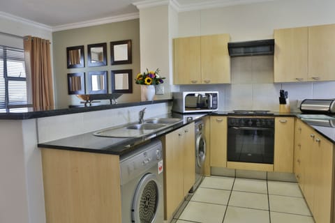 Apartment, 2 Bedrooms | Private kitchen | Full-size fridge, microwave, oven, stovetop