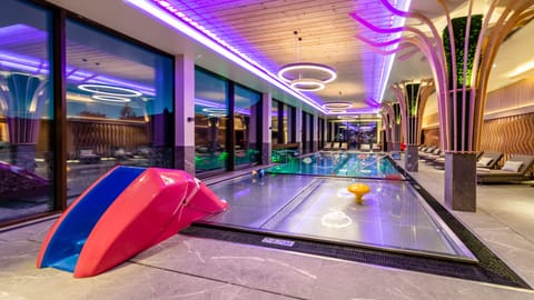 Indoor pool, 2 outdoor pools, open 7:00 AM to 9:00 PM, pool umbrellas