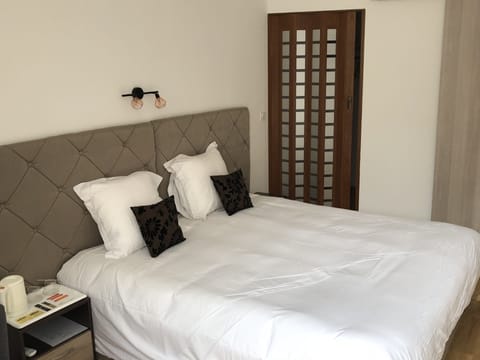 Standard Double Room, 1 Queen Bed | Individually decorated, blackout drapes, soundproofing, free WiFi