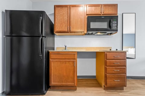 Standard Room, 2 Queen Beds, Non Smoking | In-room safe, desk, laptop workspace, iron/ironing board